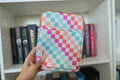 Checker Books & Device Sleeves